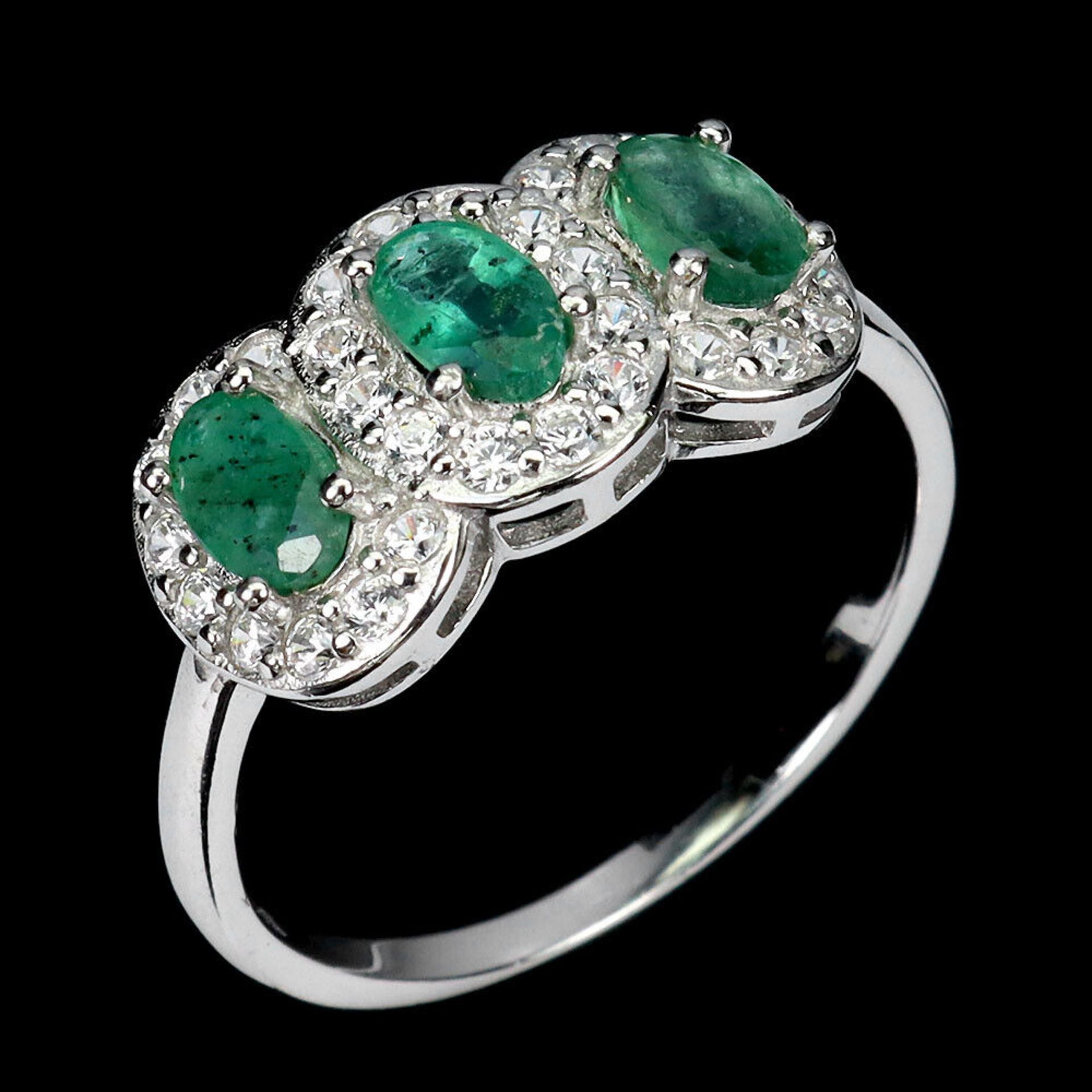 A 925 silver triple cluster ring set with oval cut emeralds and white stones, ring size N.5. - Image 2 of 3