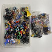 A collection of various McDonald happy meal toys.