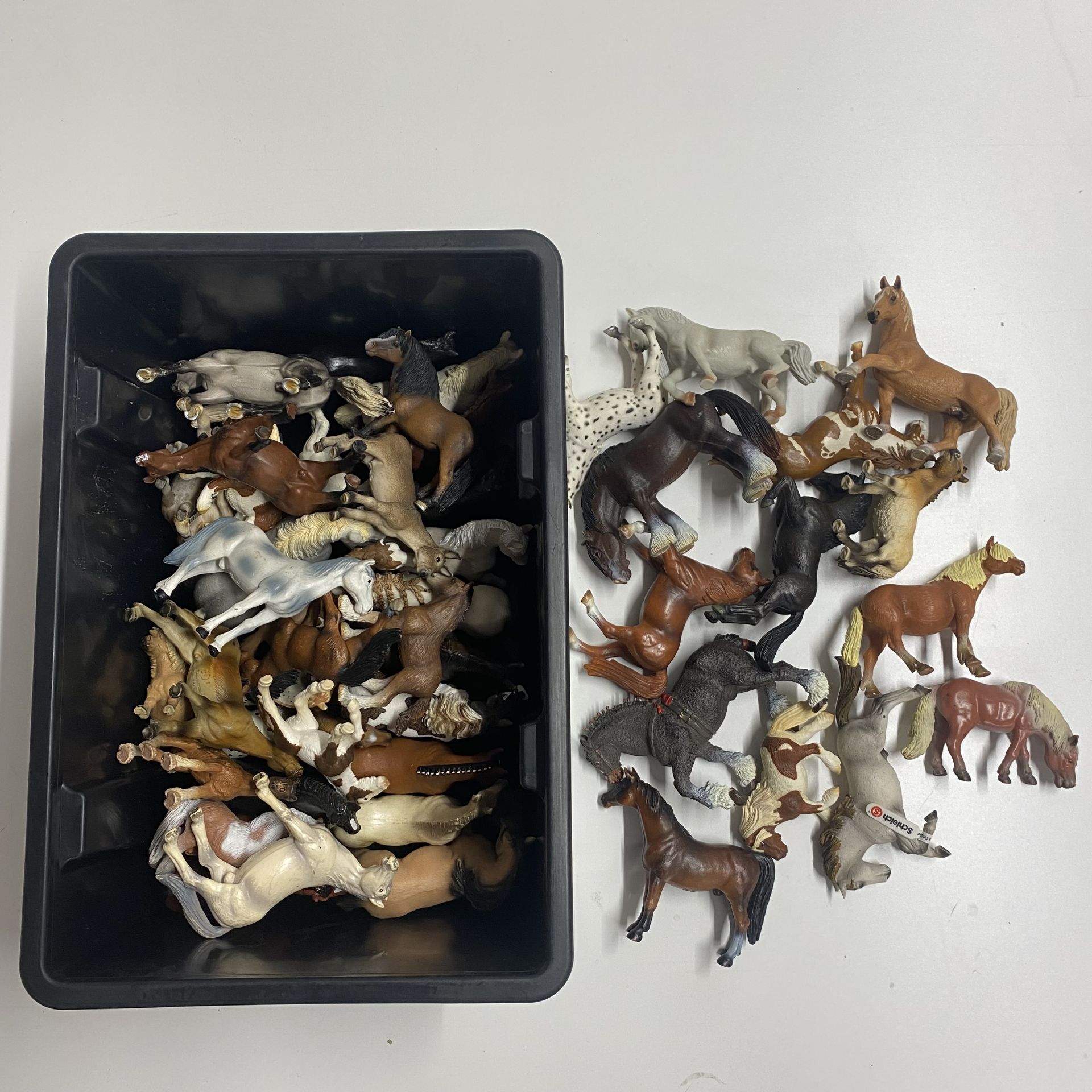 A quantity of Schleich horses.