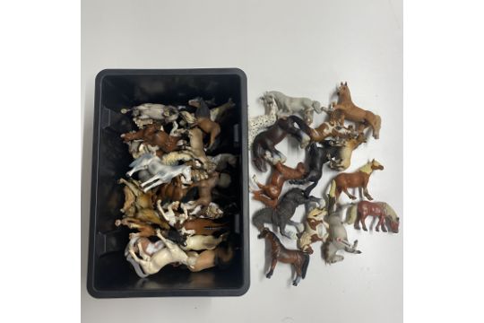 A quantity of Schleich horses.