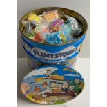 A very large quantity of The Flintstones including McDonalds happy meal toys.