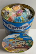 A very large quantity of The Flintstones including McDonalds happy meal toys.