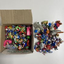 A collection of early SEGA Mario figures.