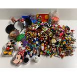 An extensive collection of Disney Micky Mouse figures.