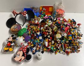 An extensive collection of Disney Micky Mouse figures.