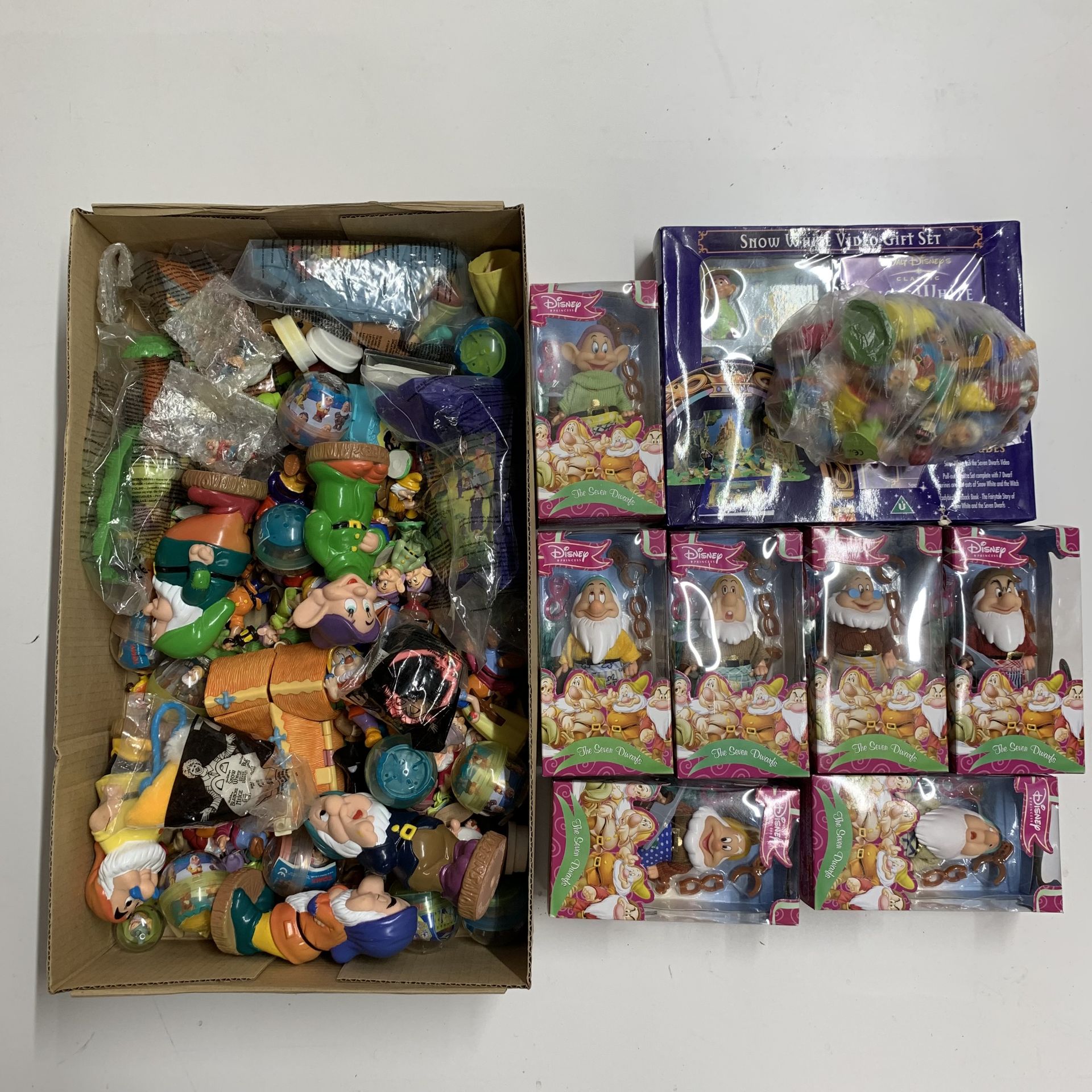 A large quantity of Disney Snow White characters etc.