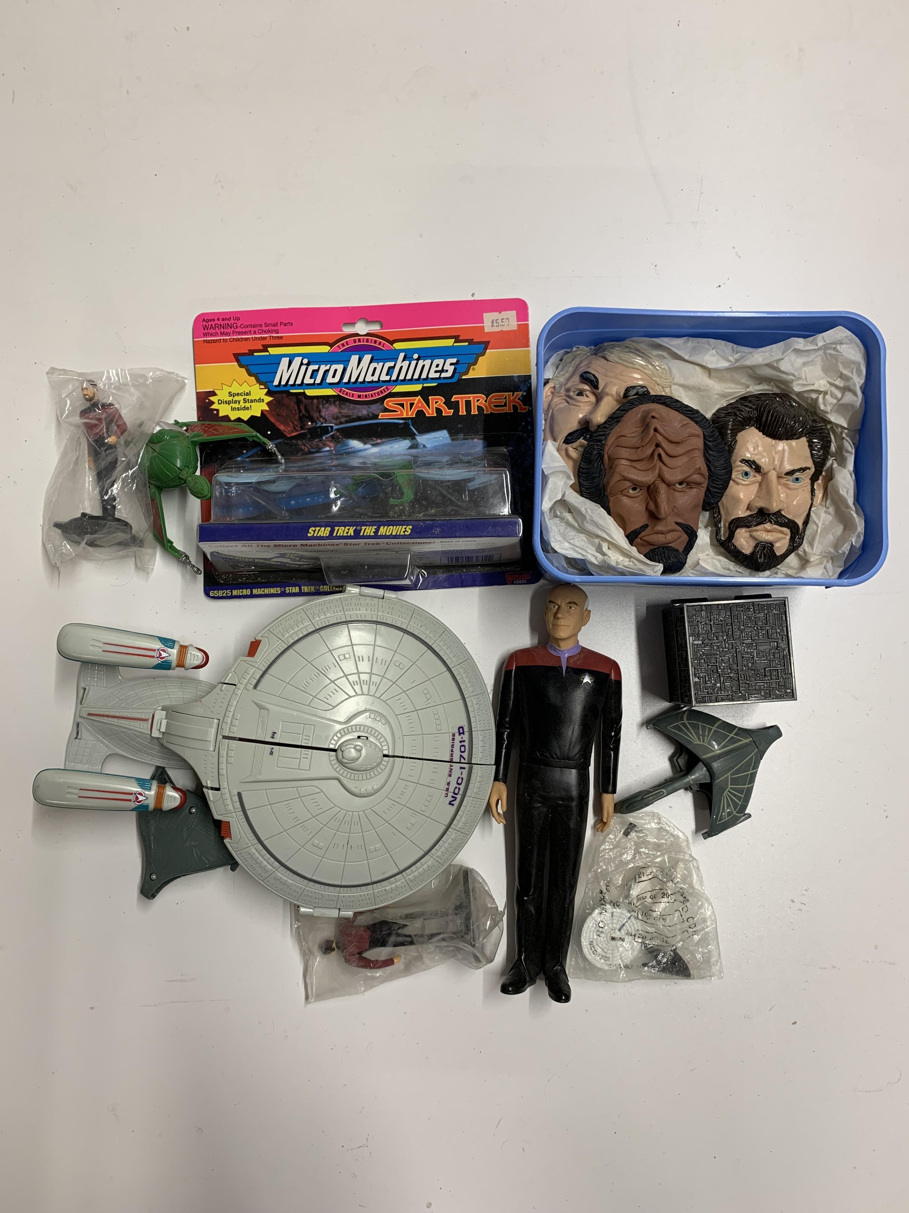 A quantity of various Star Trek toys including an interactive board game etc.