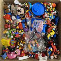 An assortment of Disney Micky Mouse figures.