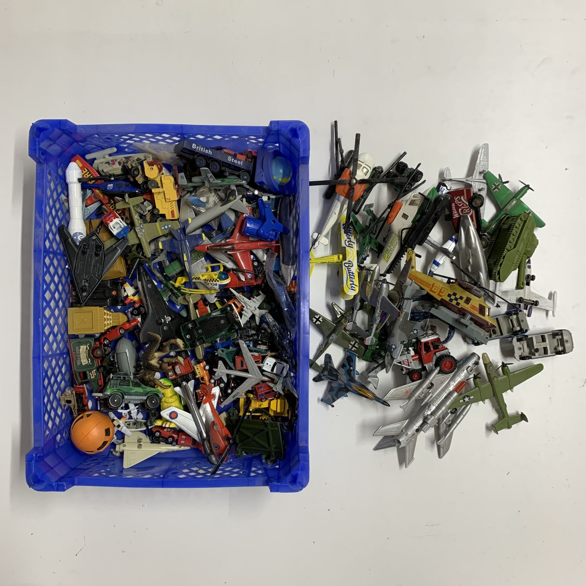 A quantity of various die cast and plastic model planes and vehicles.