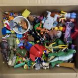 Three boxes of mixed toys including Disney and others.