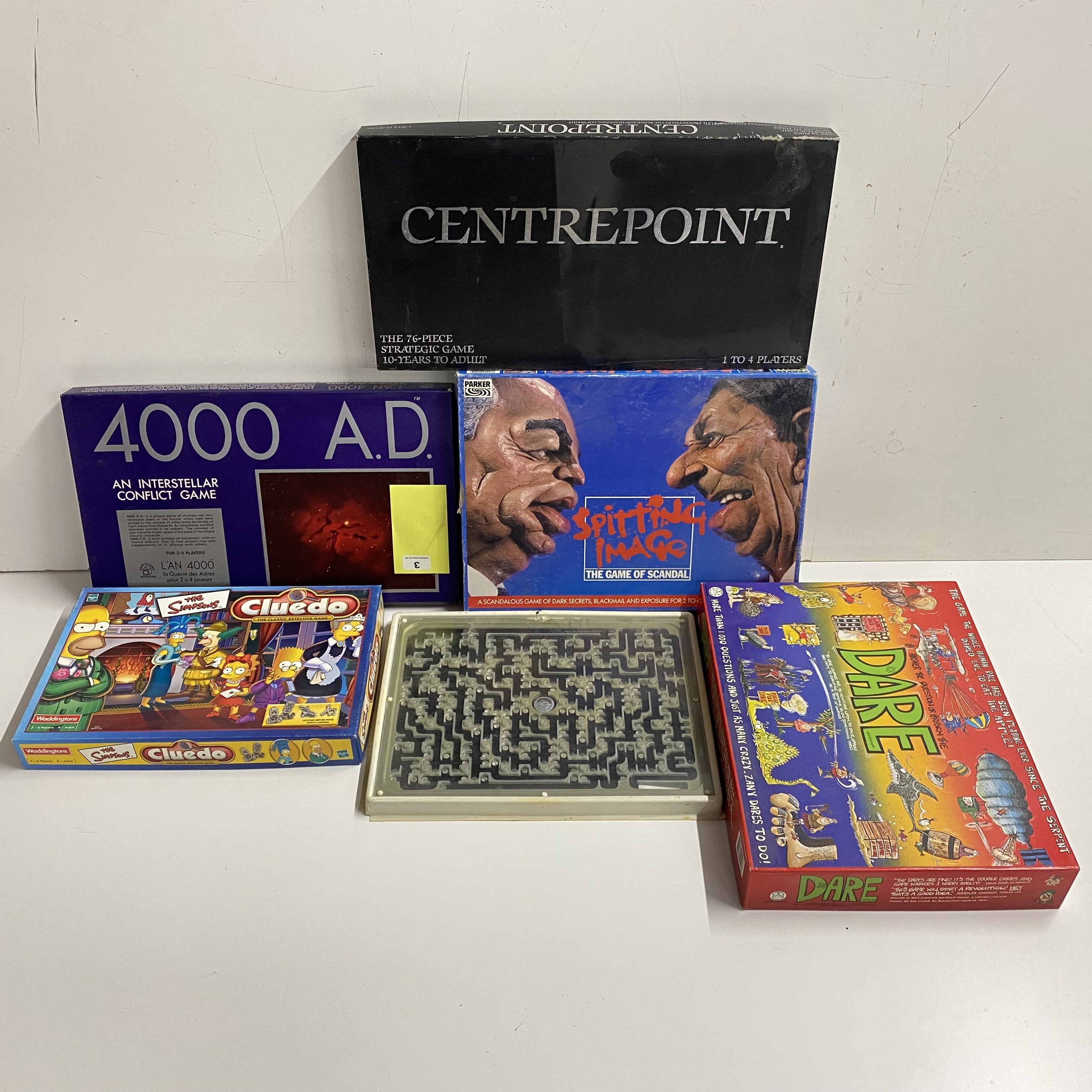 Six board games including Spitting Image.