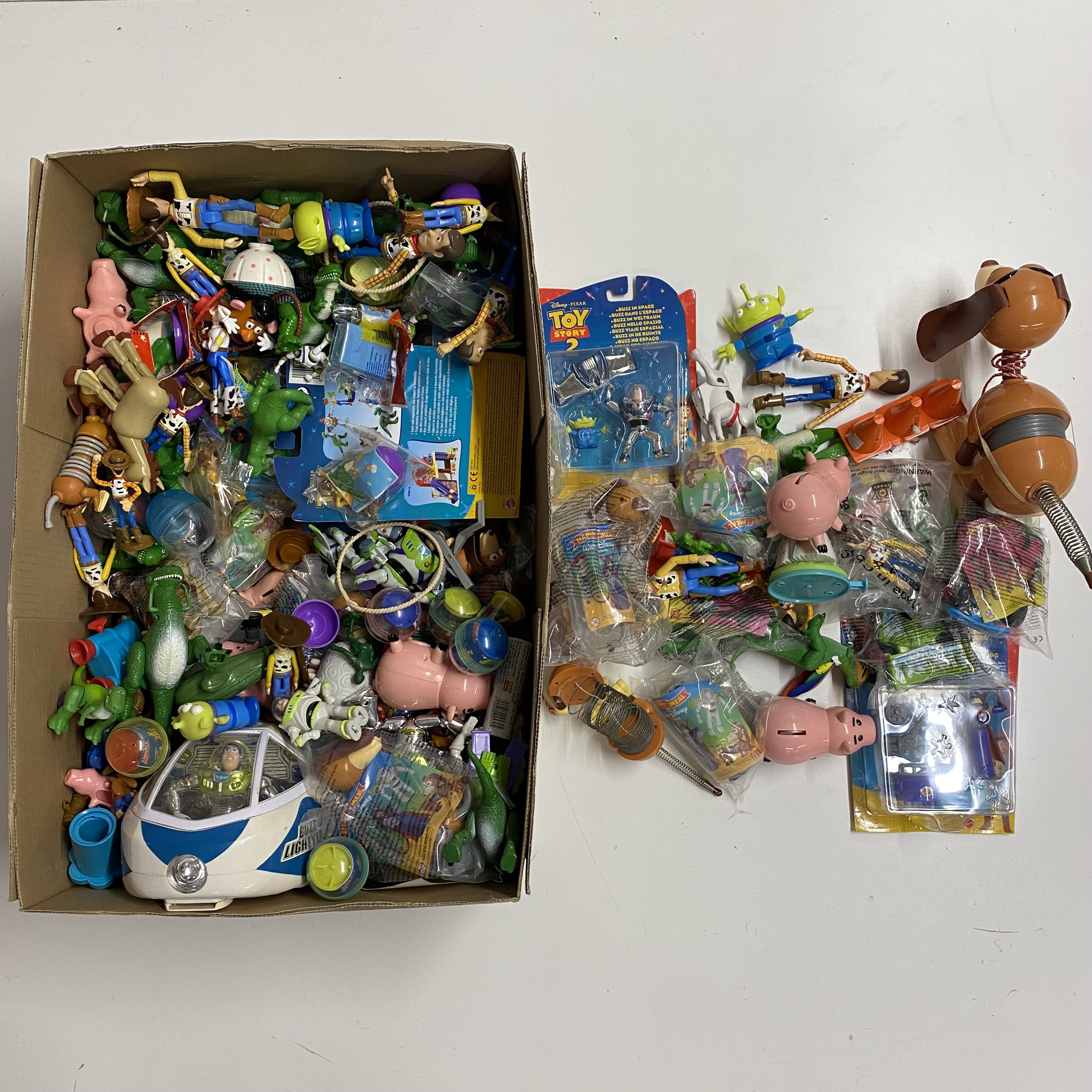 A large quantity of Disneys Toy story characters.