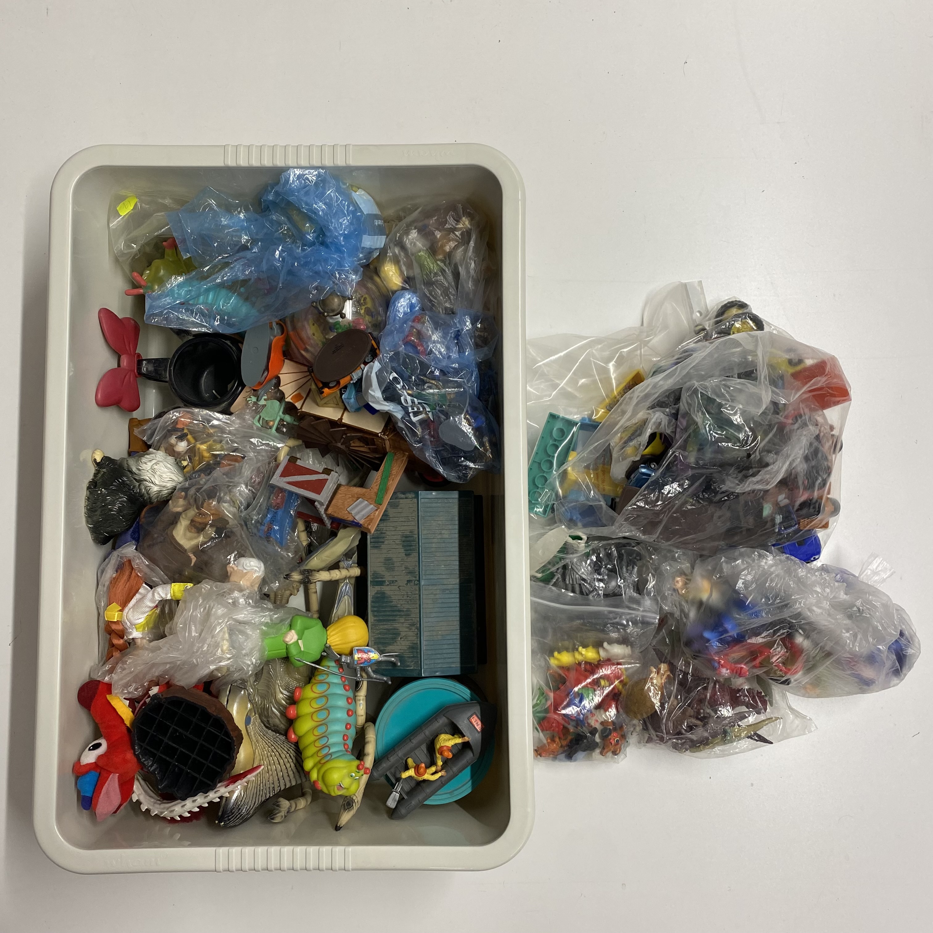 A quantity of various mixed toys including Disney.