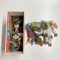 A box of various dinosaur toys.