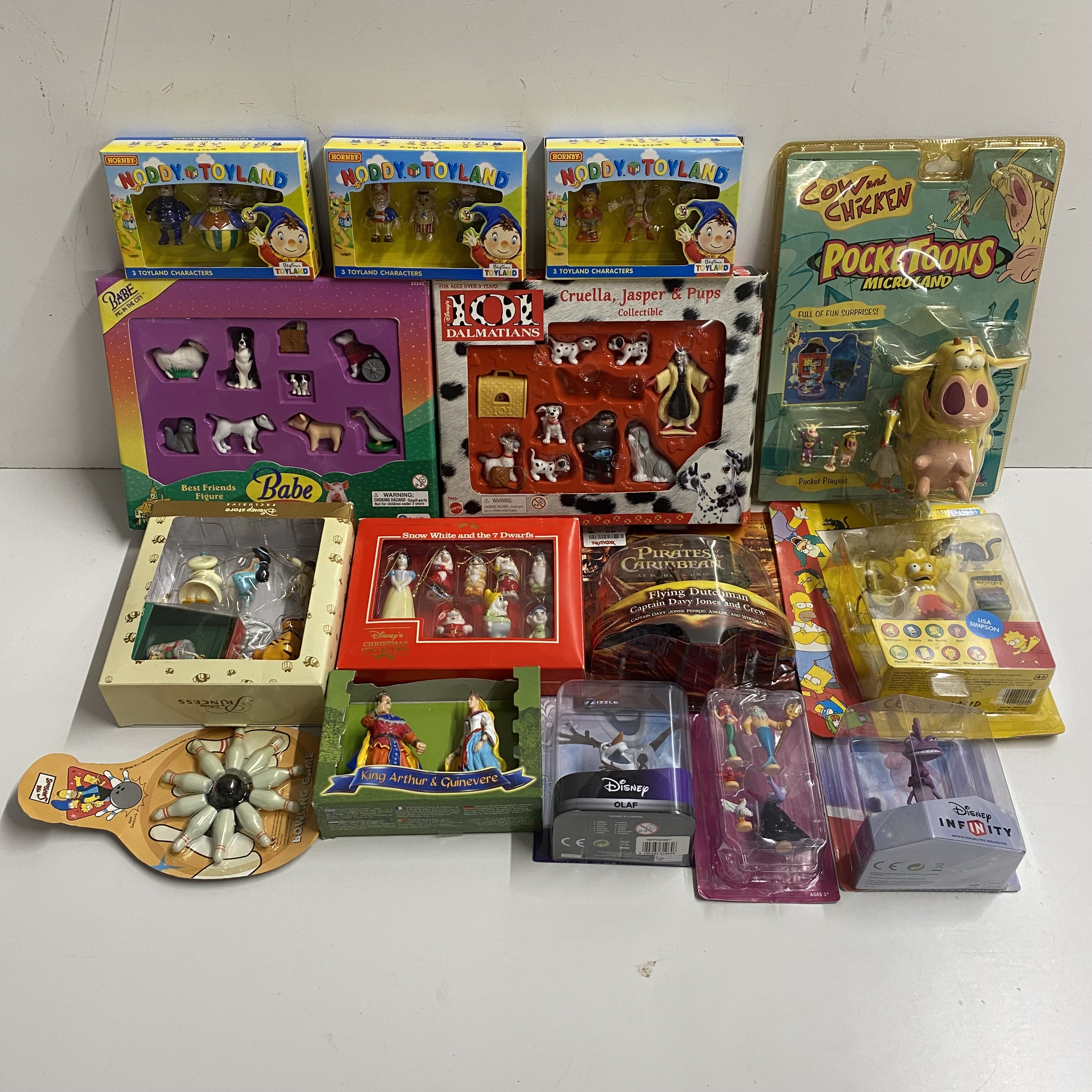 A mixed box of sealed toys including cow and chicken pocketoons.