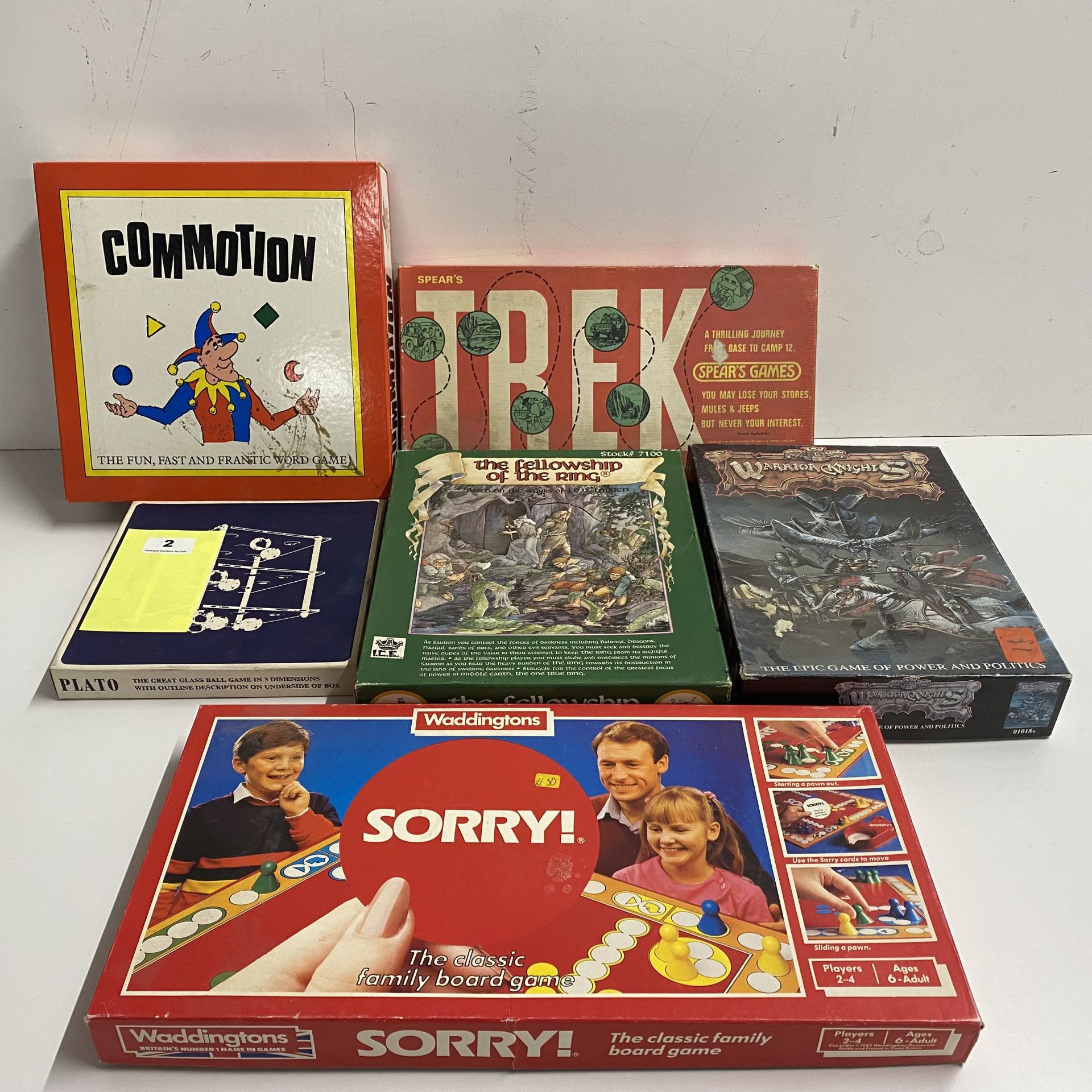 Six board games including Sorry.