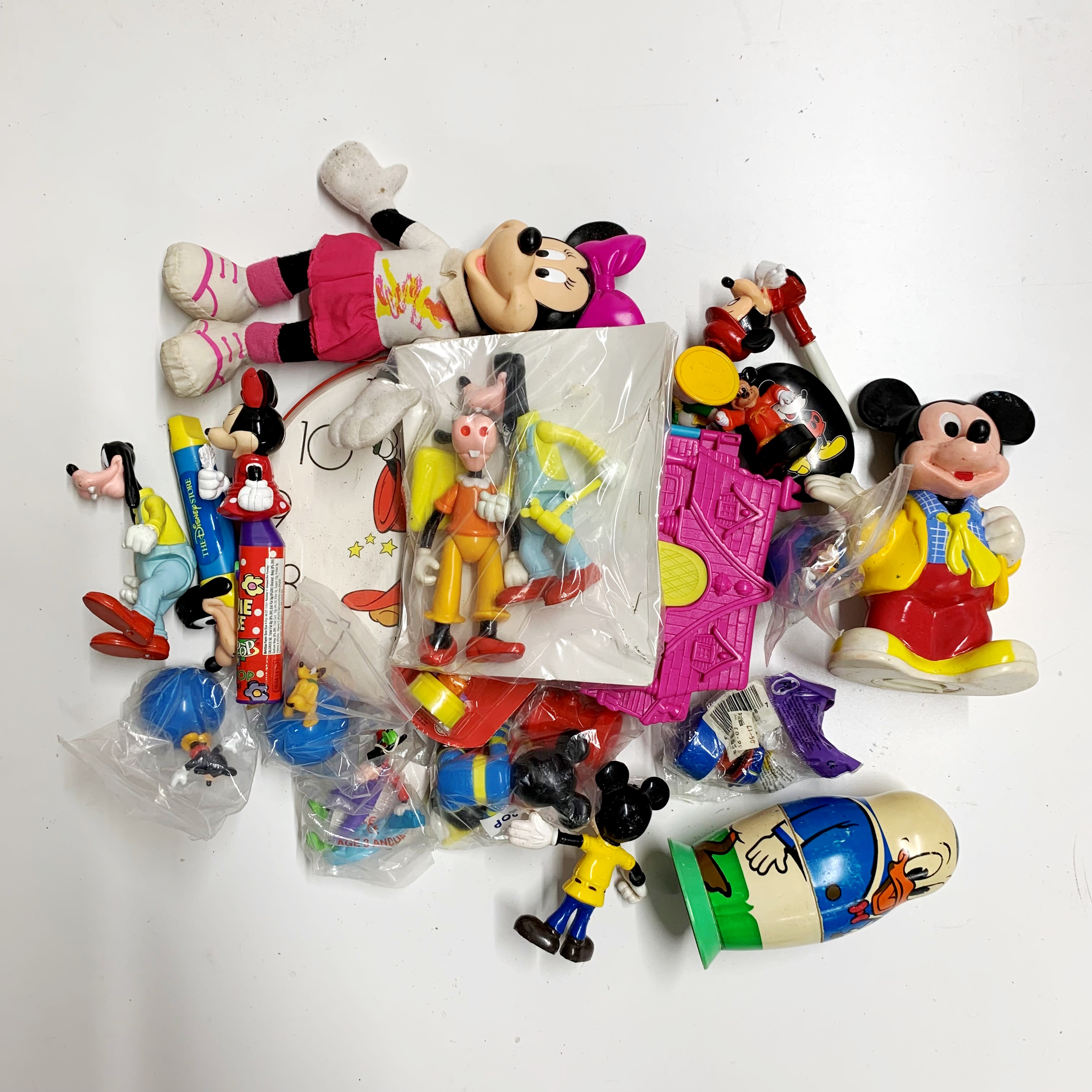 A quantity of Disney Mickey and friends characters etc.