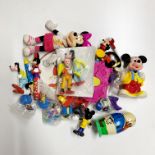 A quantity of Disney Mickey and friends characters etc.