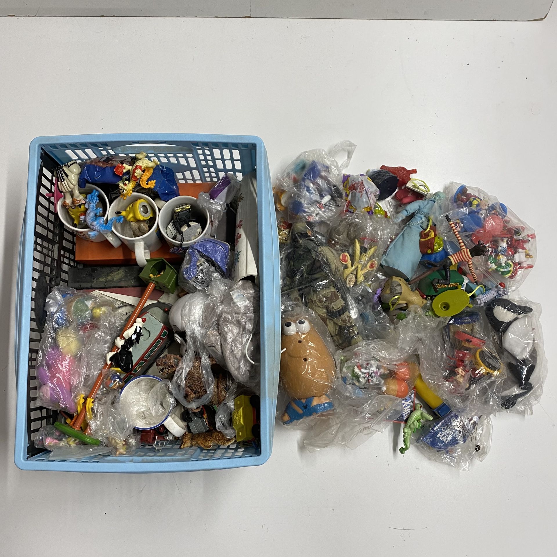 A large quantity of various toys including Disney and others.