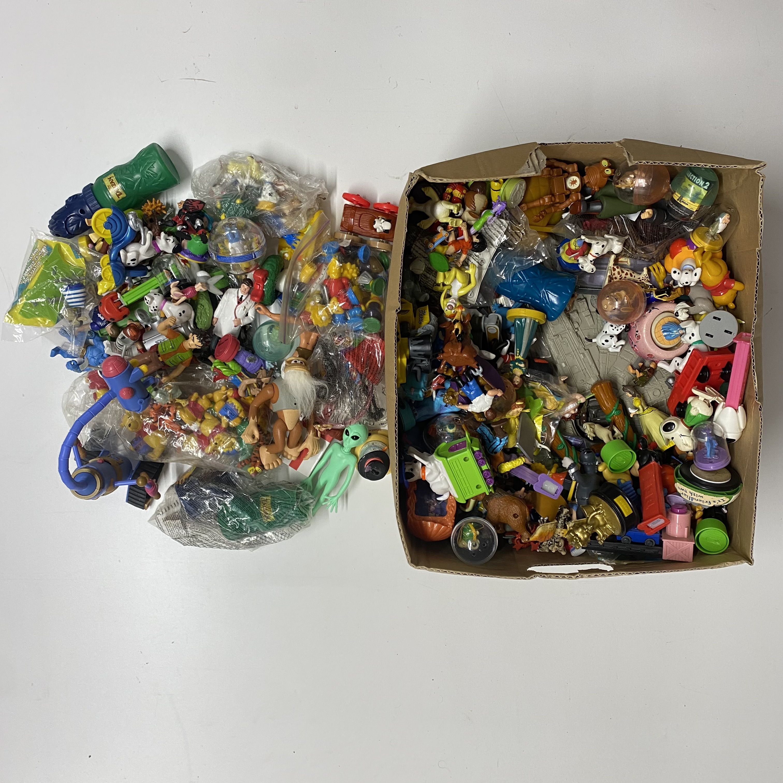 A large collection of various different toys including Disney.