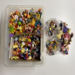 A very large collection of various Disney characters including Winnie the Pooh , Sle