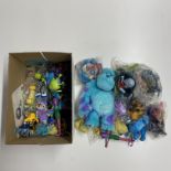 A box containing Disney's Monster INC toys.