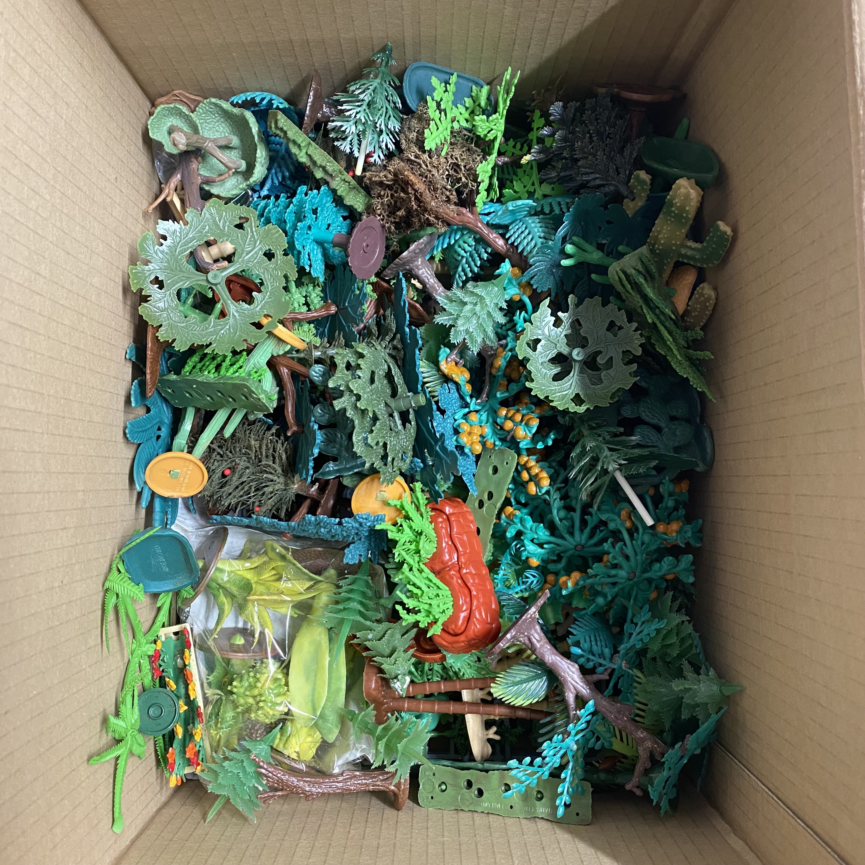A box containing plastic trees etc. possibly for a diorama. - Image 2 of 2