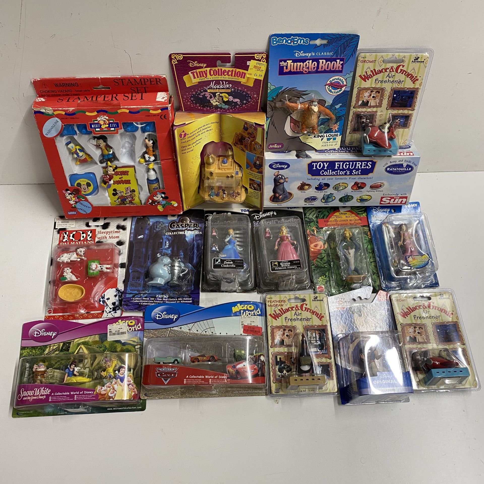 A box of mixed sealed toys mainly Disney characters including 101 Dalmations etc.