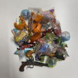 A collection of Disneys Peter Pan toys including early McDonalds happy meal toys.