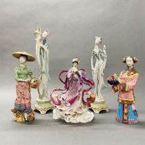 A group of two Chinese porcelain figures together with a Franklin Mint figure and a further two