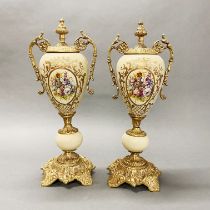 A pair of continental ormulu mounted porcelain garnitures, H. 46cm.