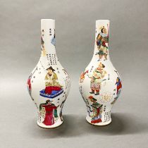 A pair of hand enamelled Chinese porcelain vases, H. 33cm.