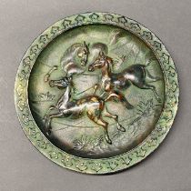 A bronze dish decorated with horses, Dia. 25cm.