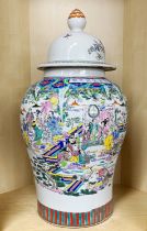 A very large Chinese mid 20thC hand painted porcelain jar and lid, H. 68cm.
