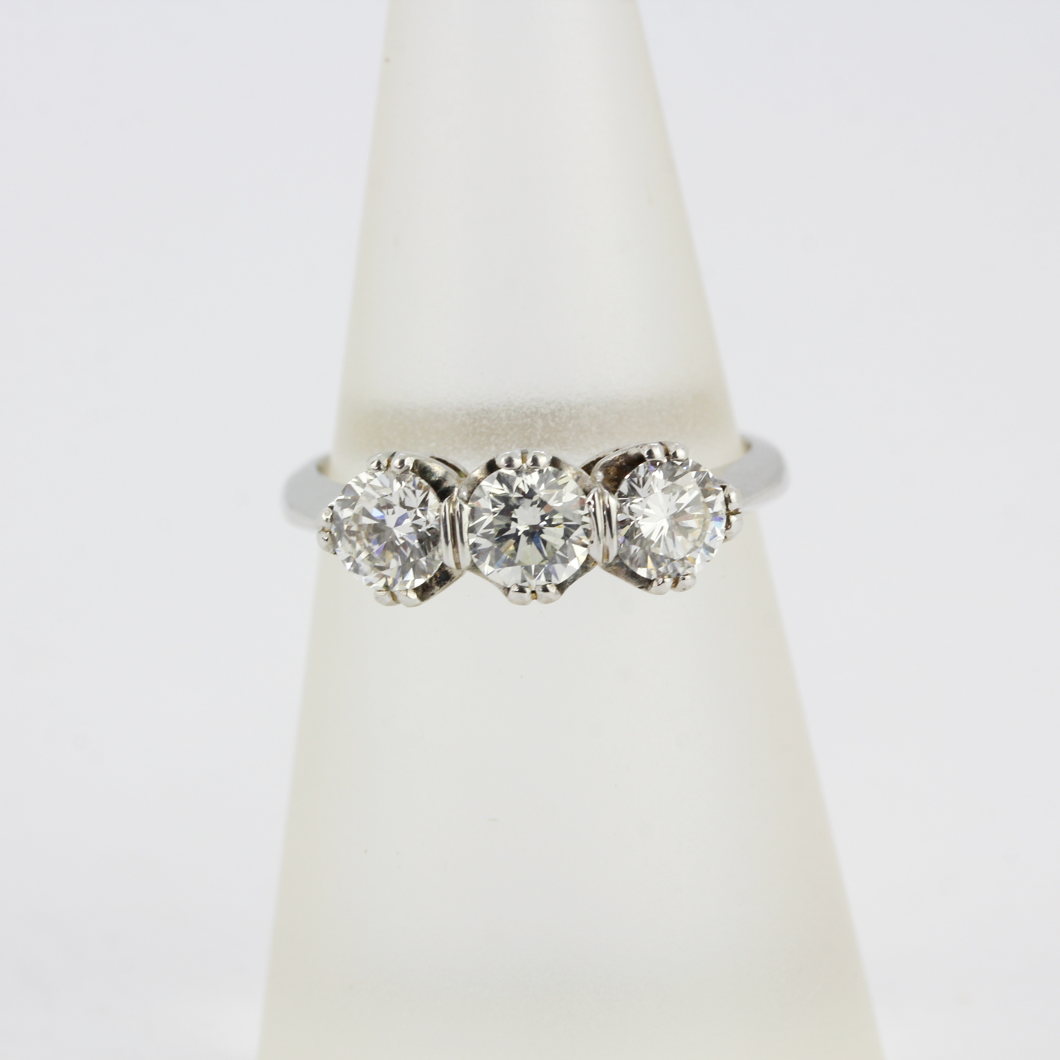 A white metal ring (tested high carat gold) set with large brilliant cut diamonds, approx. 1.20ct - Image 4 of 4