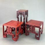 Three useful Chinese carved wooden stands, H. 38cm.