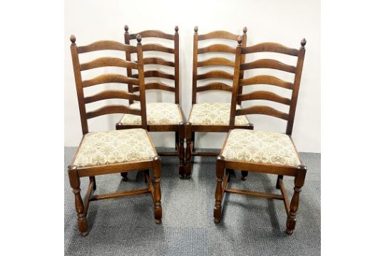 A set of four oak ladderback dining chairs. - Image 1 of 2