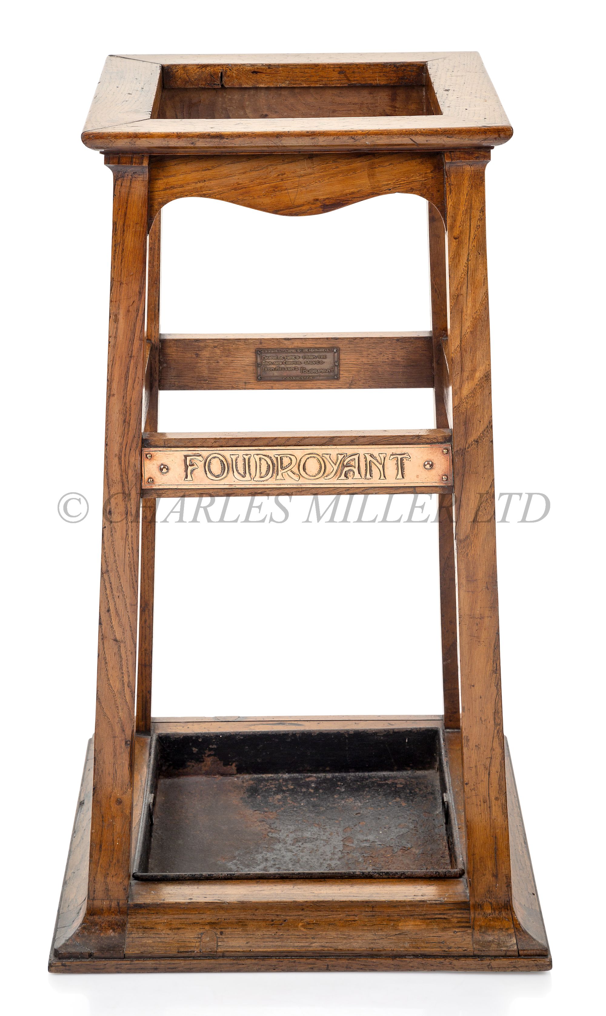 AN UMBRELLA STAND MADE FROM 'FOUDROYANT' OAK BY GOODALL, LAMB & HEIGHWAY, MANCHESTER, CIRCA 1898