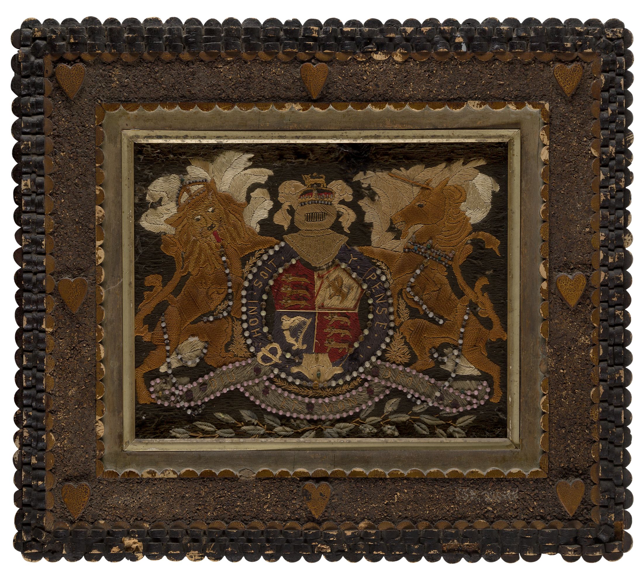 A 19TH CENTURY SAILOR'S WOOLWORK PICTURE AND FRAME