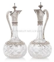 A PAIR OF GERMAN SILVER-MOUNTED ROYAL PRESENTATION CUT GLASS CLARET JUGS, CIRCA 1869