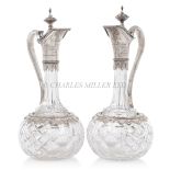 A PAIR OF GERMAN SILVER-MOUNTED ROYAL PRESENTATION CUT GLASS CLARET JUGS, CIRCA 1869