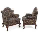 A RARE PAIR OF FIRST CLASS ARMCHAIRS MADE FOR THE PALLADIAN LOUNGE OF R.M.S. 'AQUITANIA', PROBABLY