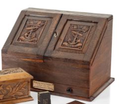 A STATIONERY CABINET MADE FROM 'VICTORY' WOOD, CIRCA 1900