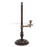 AN ADJUSTABLE CANDLESTICK MADE FROM THE WOOD OF H.M.S. 'BRITANNIA'