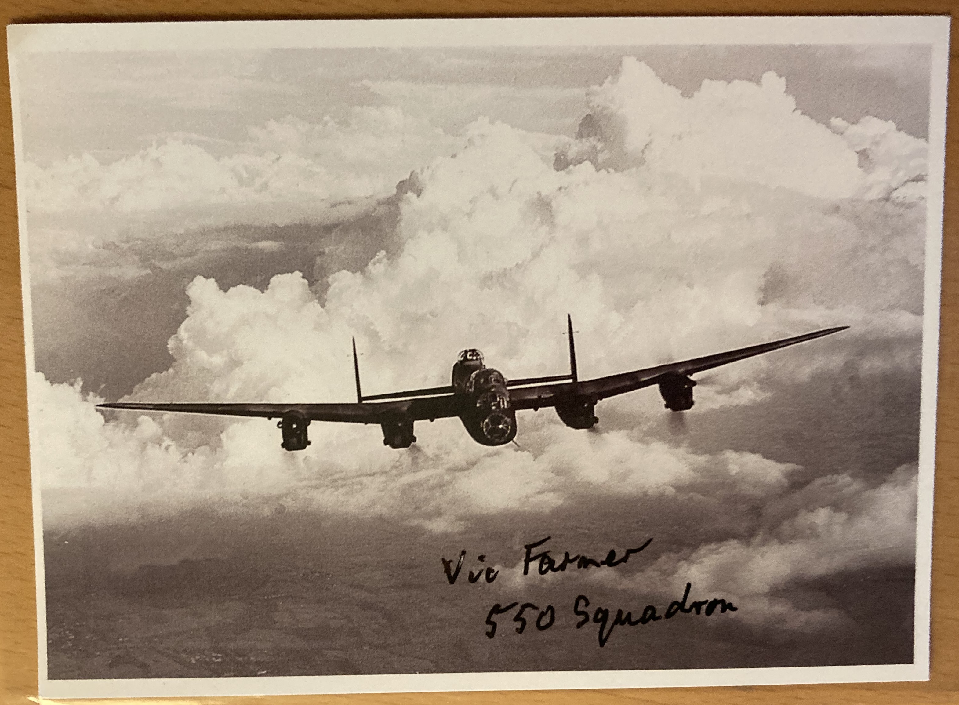 WW2 F/O Vic Farmer 550 sqn signed 6 x 4 inch Lancaster in flight picture. Bomber Command veteran.