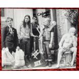 Young Ones Christopher Ryan signed amusing group scene 10 x 8 inch b/w photo. Good condition. All