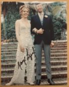 James Bond George Lazenby signed 10 x 8 colour Wedding scene photo with Diana Rigg. Good