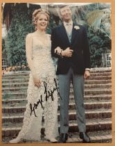 James Bond George Lazenby signed 10 x 8 colour Wedding scene photo with Diana Rigg. Good