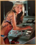 Britt Ekland James bond actress signed sexy swim suit 10 x 8 inch colour photo. Good condition.