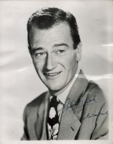 John Wayne signed 10x8 inch vintage black and white photo. Good condition. All autographs come